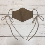 くすみブラウンのリボンマスク