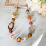 ベージュ✳︎ブラウン✳︎赤のロングネックレス