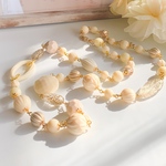 *アイボリーホワイトのロングネックレス