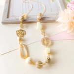 *ホワイト×アンティークゴールド のロングネックレス