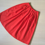 オレンジリネンのタックスカート