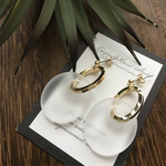 clear white × gold ring