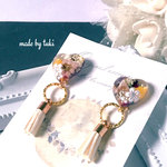 ハートにお花をギュッと詰め込んだピアス　レジン　ドライフラワー　デート　プレゼントにも