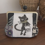 ミナペルホネンとpjcクロッチくんで作成しましたがま口ポーチです