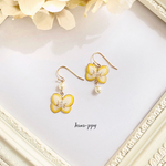 white yellow wire flower asymmetry ピアスorイヤリングor樹脂ピアスor樹脂ノンホールピアス