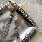 beige tassel