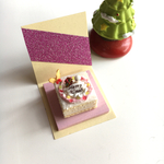 雪だるまとツリーのカラフルクリスマスケーキ