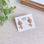 キラキラジルコニアリボンピアス/イヤリング サージカルステンレス nonoacs