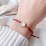 境を越えて届けられるクリスタルライトグレーディライトスワロフスキーの組紐ブレスレット