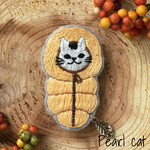 ニャンパーの刺繍ブローチ【黄・白黒猫】