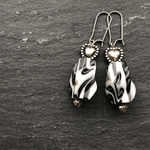 ▷ 個性的チャーム × ハート ピアス/イヤリング