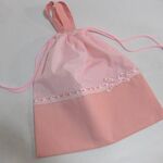 大きいもち手つき巾着   ピンクドット柄×小花リボン