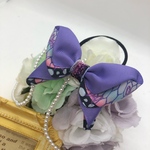 中央キラキラ♡パープルの蝶々リボンのヘアゴム 