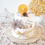 クレイケーキ　飾り付き　ウェルカムスペース　くすみピンク×ポインセチア　イミテーションケーキ　クリスマスケーキ