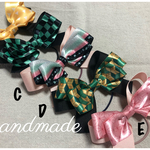 ☆新作!!     立体感のある  鬼  和柄のぷちカワイイ滅  リボンヘアゴム刀☆