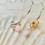 桜🌸花びら舞うアシンメトリーサージカルステンレスピアスorイヤリング　桜色
