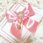 【リボンⅹスワロフスキー】ハートに桜咲くリボンコーム