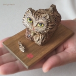 木彫り彫刻　いたずら子猫
