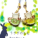 オルゴナイト　カップ猫ストラップ2個セット（イエロー＆ミントグリーン）