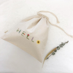SALE-12/25【HELLO巾着】愛された証を未来に紡ぐ「お守り刺繍」