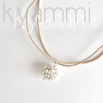 【手毬】透かし細工と天然素材 水牛の本革紐のロングネックレス〜シルバー〜