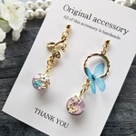 スワロフスキー・花と蝶  ピアス、イヤリング