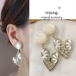 New シェル×ビジューハートピアス。゜イヤリング