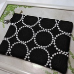 ミナペルホネンタンバリン刺繍生地を使ったポーチ