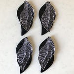 Black PU Leather Double Leaves Pendant Tops