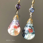夕日と藍色の空に一輪の彼岸花。　オルゴナイト　雲レジン　蓄光三日月ドロップ　ピアス　イヤリング