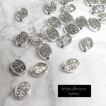 3/11ロット変更　holly medal beads～ 20pcs