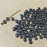 SILVER SMILE SPACER BEADS