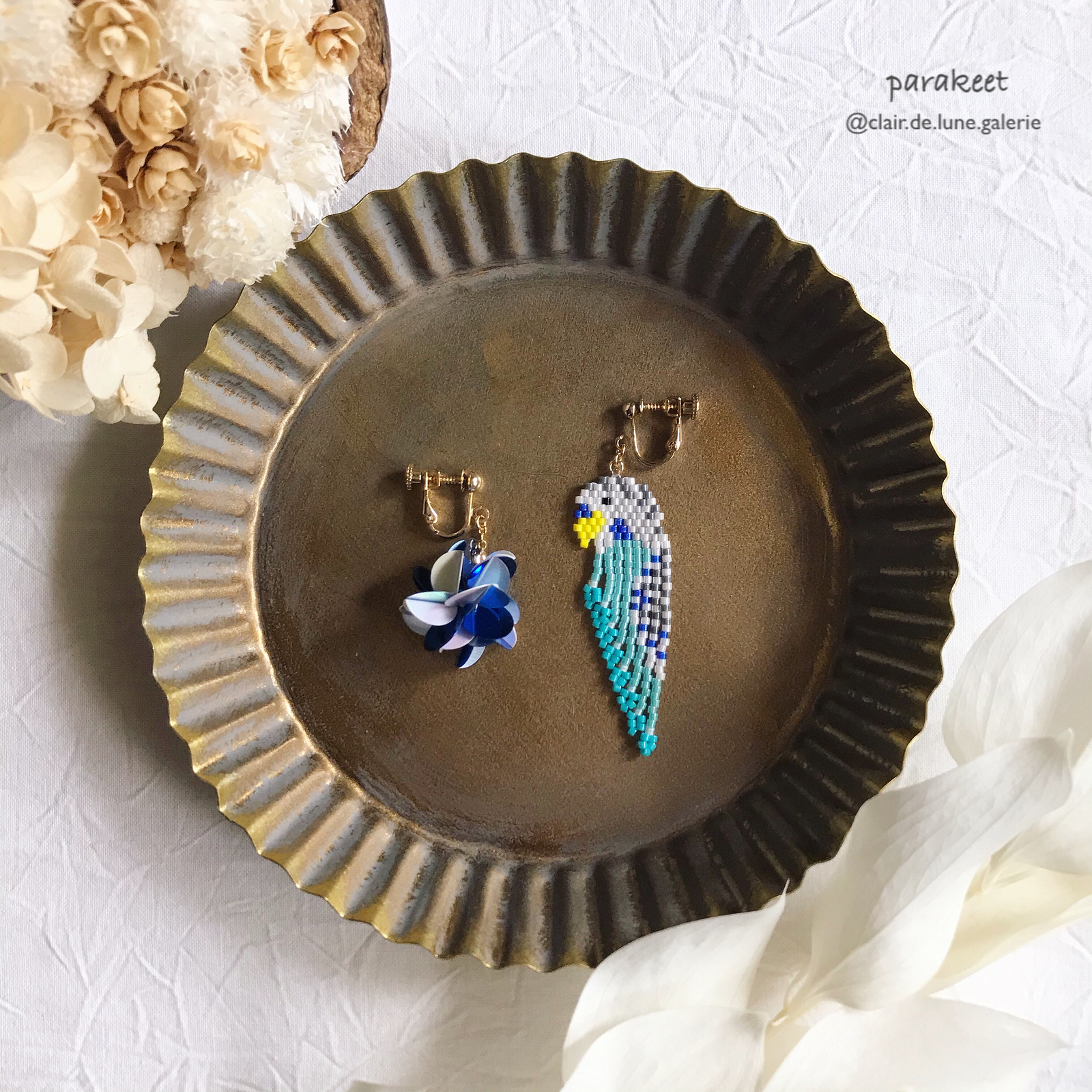 ブルーインコアシンメトリーピアス イヤリング 5,127円
