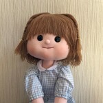 なんだか懐かしい感じの母の手作り人形　女の子オレンジ花柄ワンピース　２