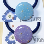 紫外線で色が変わる！煌めきflowerヘアゴム(ブルー)