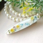 白に黄色の小花のヘアクリップ