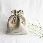 カモミールを刺繍のリネンの巾着ポーチ