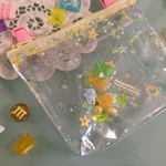 今だけお試しSALE!クリア☆オーロララメ☆ゆめかわシャカシャカ移動ポケット　黄色