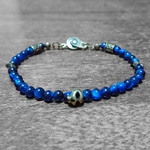 tinny star&skull blue tiger eye single stone brace
