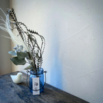 Dryflowers and glass bottle. Blue 