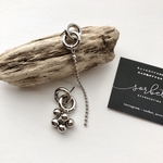 silver double ring pierce ∴ asymmetry