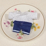レーストップスとベルト付きズボン