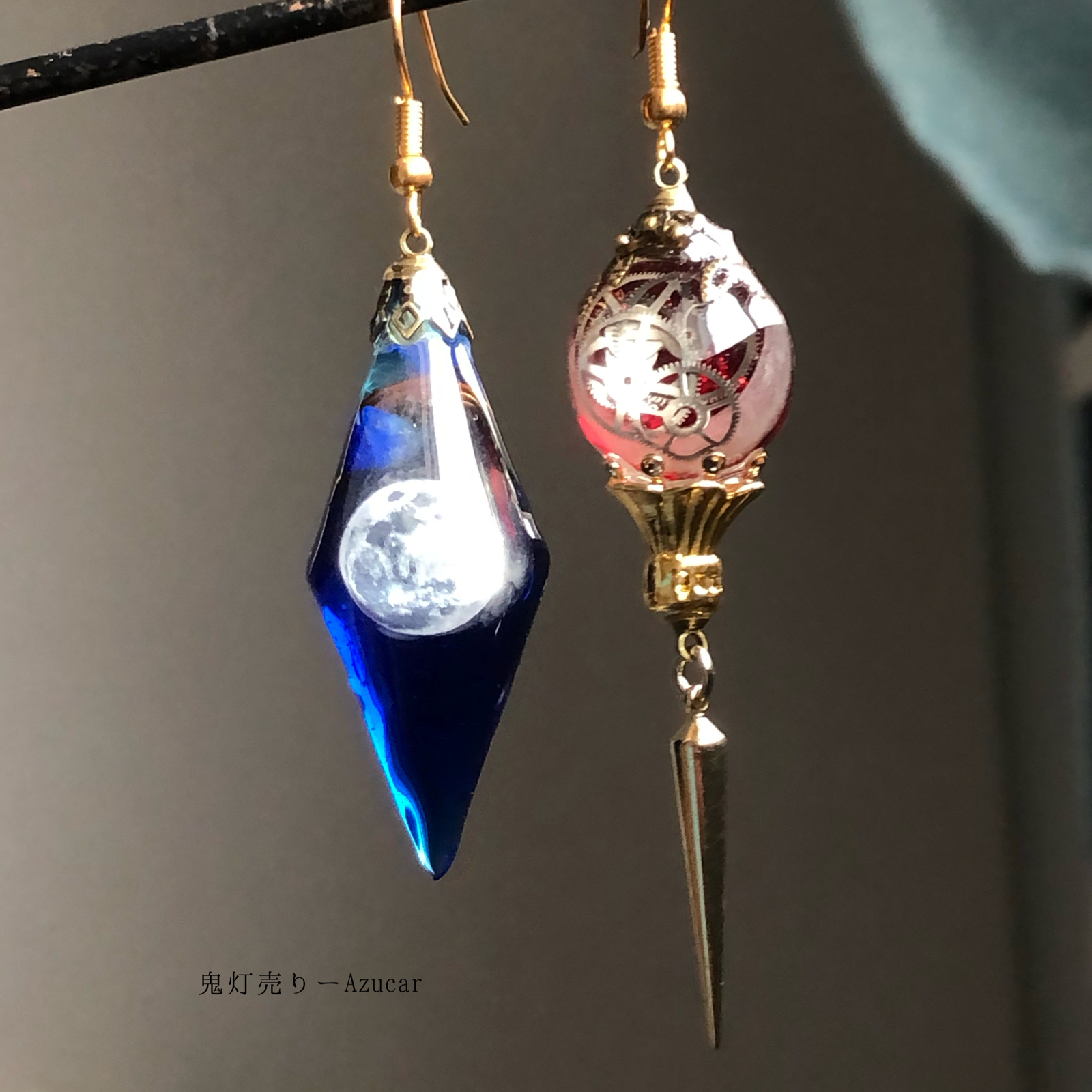 満月ペンデュラムとフローライトの蓄光オルゴナイトピアス