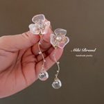 オーロラフラワーと鈴丸ビーズのクリアピアス/イヤリング