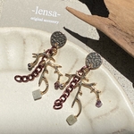 1136.ブラウンチェーン×小枝の個性派ピアス🌳⛓ lensa