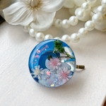 透き通る青に浮かぶお花のポニーフック