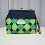 カラフルビビッドグリーンの がま口バッグ