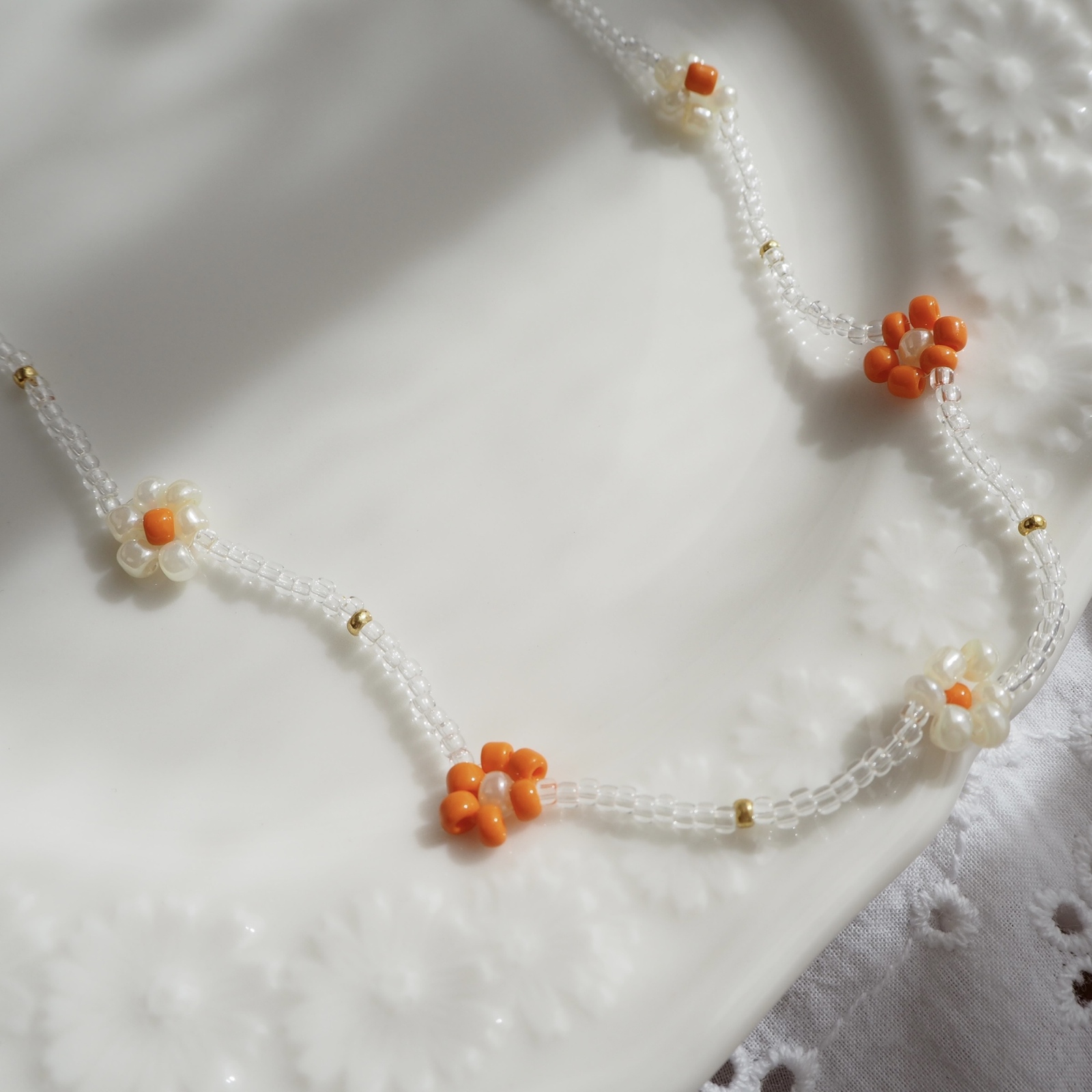 ﾋﾞｰｽﾞﾈｯｸﾚｽ》オレンジのお花ビーズネックレス オレンジ