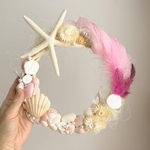 Pink feather shell wreath