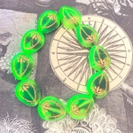 光る！【2コセット】JIRI＊IVANA #czech beads#チェコビーズ　lotus18✖️14㎜ peridot green ＊black tiger/bronze